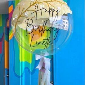 Burbuja con diseño de hoja de flor dorada y texto negro personalizable